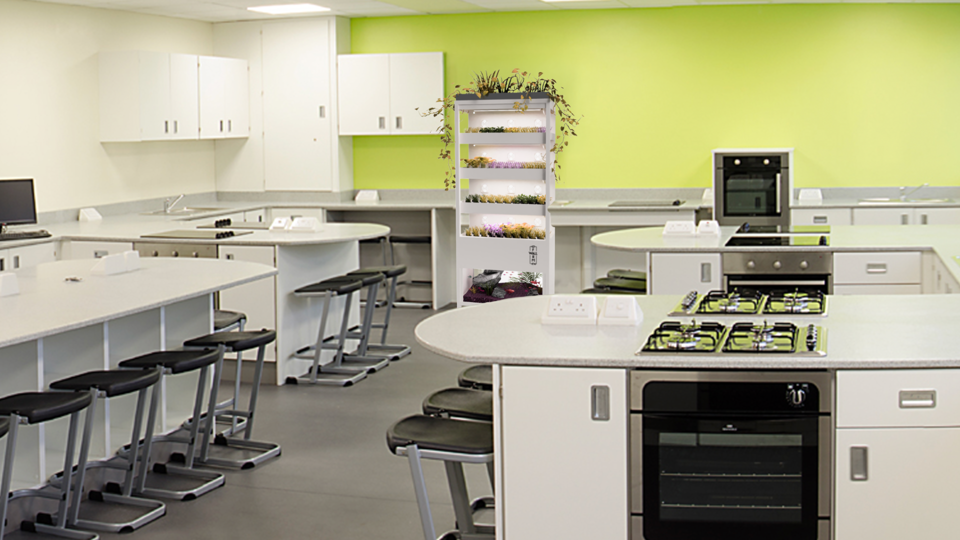 A Farmwall vertical growing unit installed inside a bright Food Studies kitchen with benches, stoves and preparation space